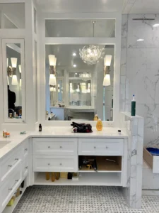 White custom floating bathroom vanity installed by Borough Woodworks in Greensboro, NC.
