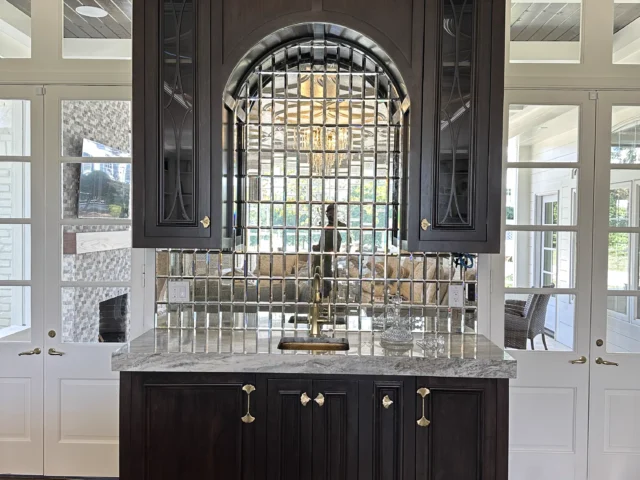 Stained Cherry Wet Bar with Custom CNC Mullion & Built-In Appliances